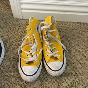 Yellow high top converse